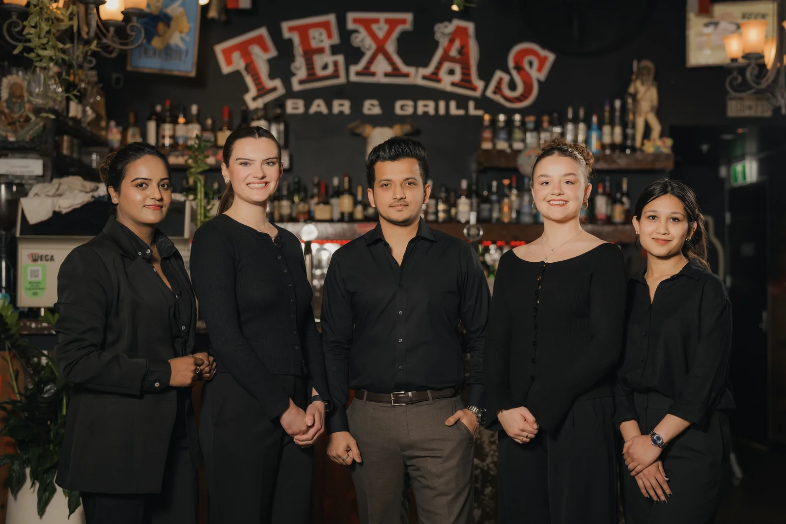 Texas Grill team member welcoming guests
